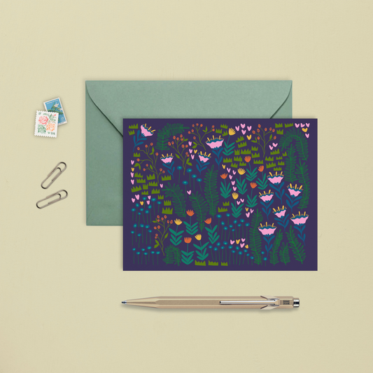 carte de souhait avec une illustration colorée d'un jardin de fleurs